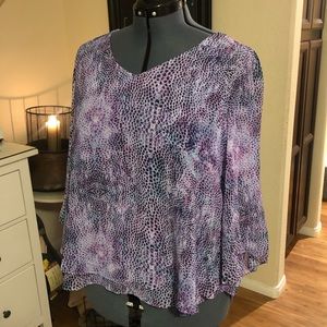 Jennifer Lopez blouse with gem closure